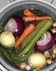 This gut-healing chicken bone broth is a great way to use up leftover vegetables.