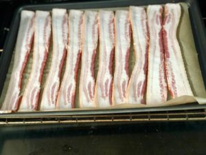 Here is the easiest way to make crispy sheet pan bacon in your oven with no mess. Try it and you'll never go back to standing over the stove. | www.grownupdish.com
