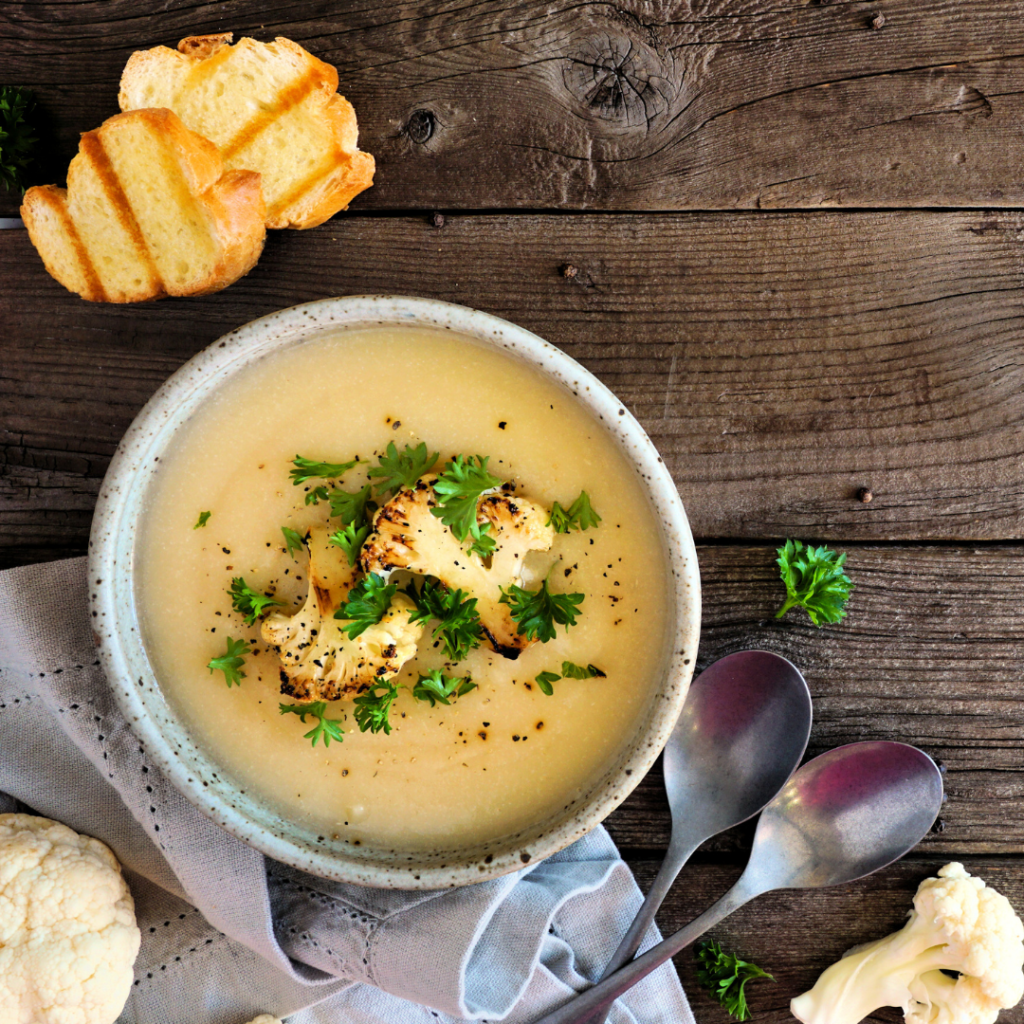 Creamy browned butter cauliflower soup uses clean ingredients but tastes rich and decadent. Vegetarian and keto and can also be made vegan. | www.grownupdish.com