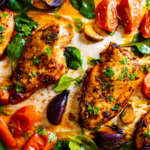 Honey Harissa Sheet Pan Chicken & Vegetables is so versatile and easy that it'll become your favorite weeknight dinner recipe. Try it! | www.grownupdish.com