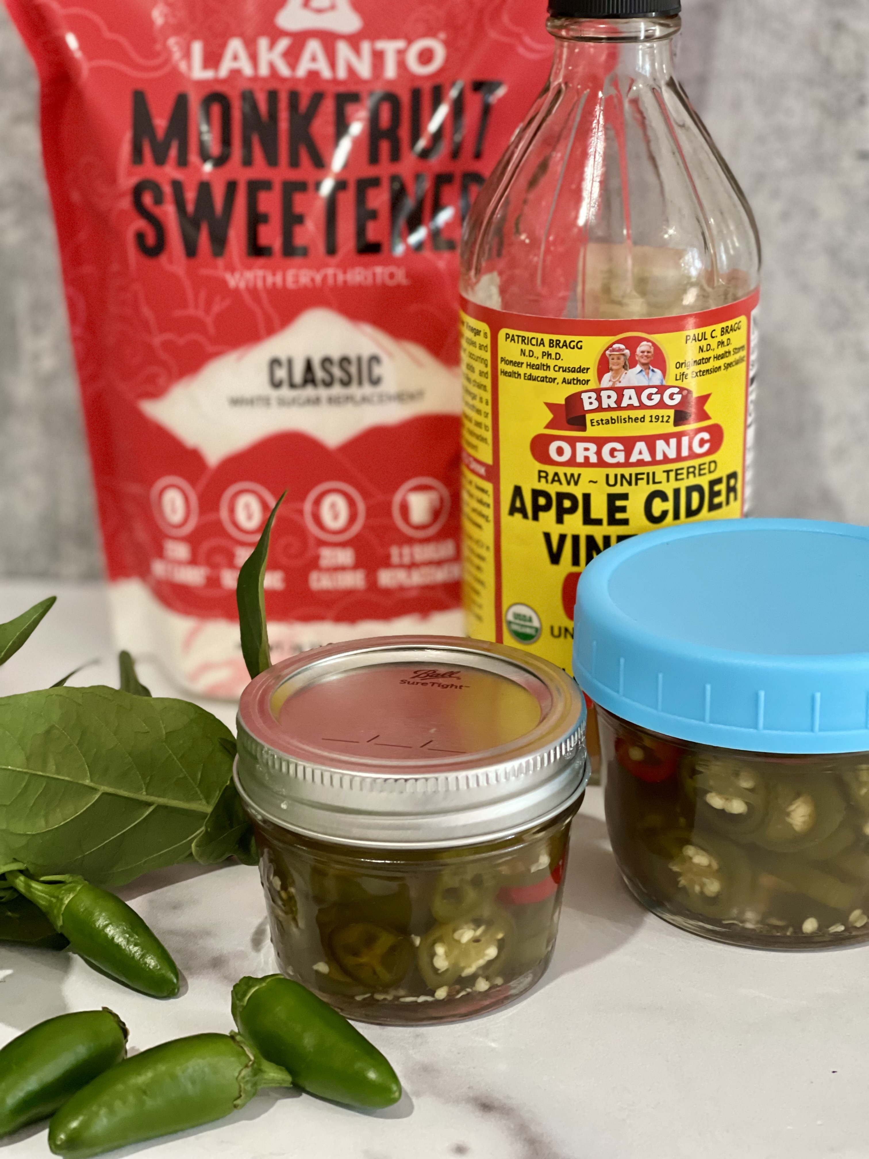 Discover how to make Sugar-Free Candied Jalapeños using no calorie monkfruit sweetener instead of sugar. They're sweet and spicy and virtually indistinguishable from the store-bought version. | www.grownupdish
