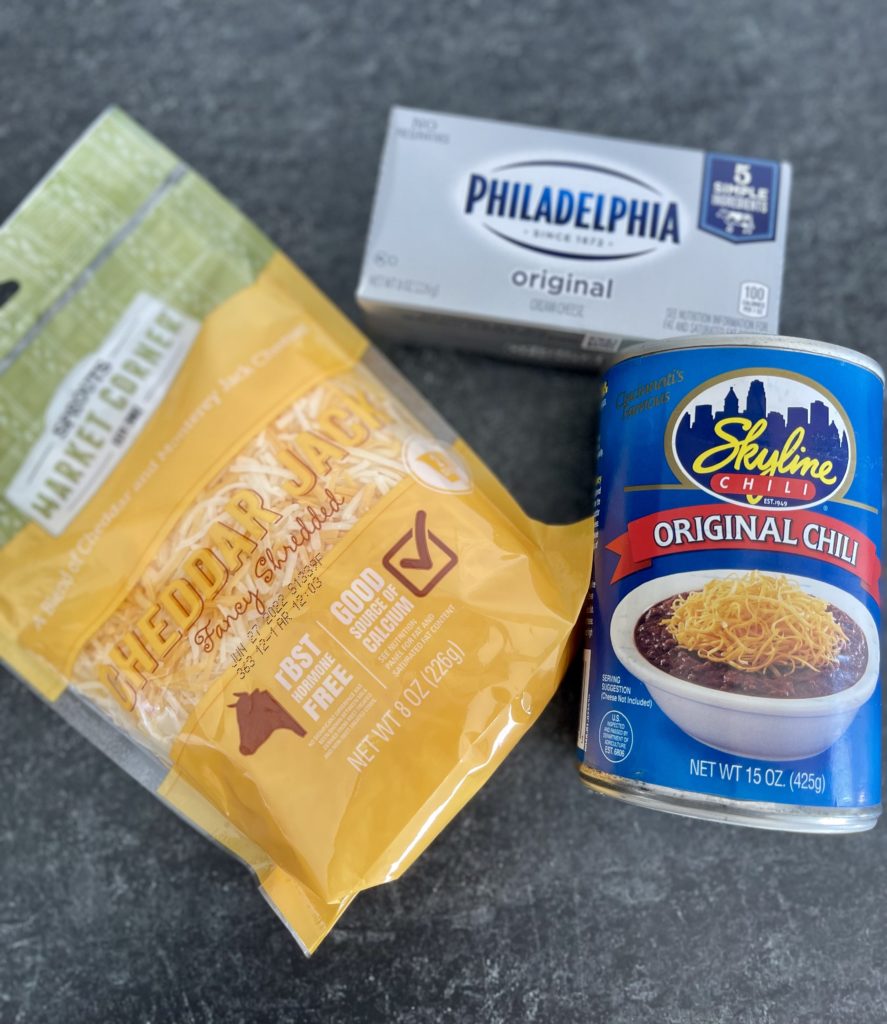 If you've visited Cincinnati, you likely tried iconic Skyline chili. Skyline Chili Dip is an easy, three-ingredient, cheesy appetizer that's sure to please. | www.grownupdish.com